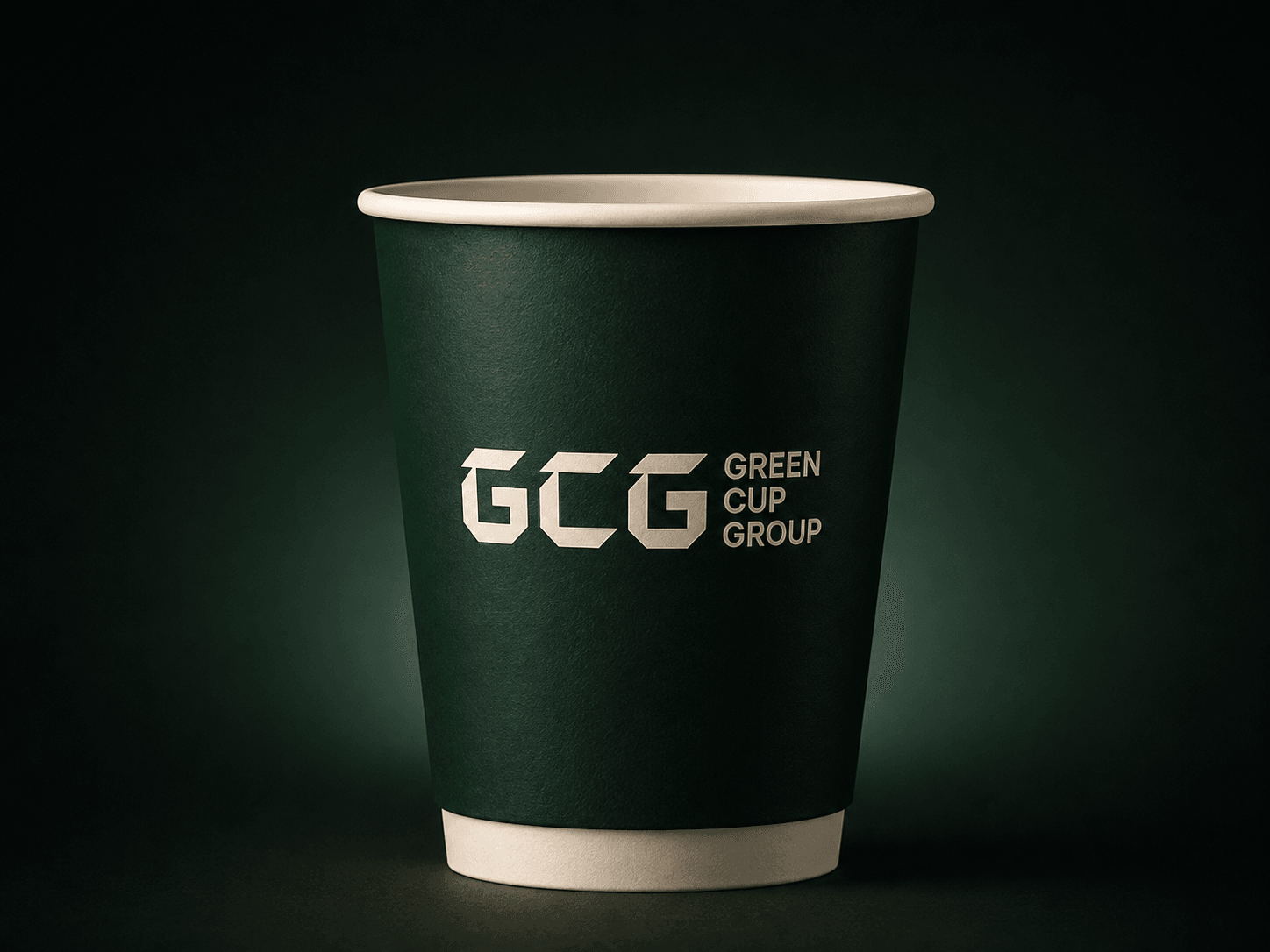 Green Cup Group double-wall cup with its printed green outer wall, ivory rolled rim and unprinted white base.